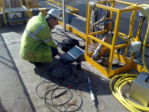 Troll 9500 multi-parameter water quality sonde being prepared to take measurements from a stilling well.